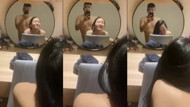Với vẻ mặt thỉa mãn em cong mông cho anh doggy trước gương